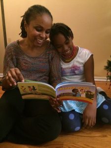 Carol and daughter reading Nerissa Golden's Island Days